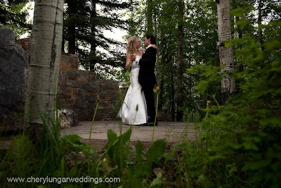 wedding couple near beaver creek chapel by cheryl ungar denver colorado wedding photographer