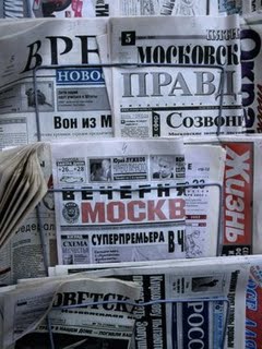 [BN15067_19-FB~Russian-Newspapers-Including-Pravda-and-Moscow-Evening-News-at-Newsstand-Moscow-Russia-Posters.jpg]
