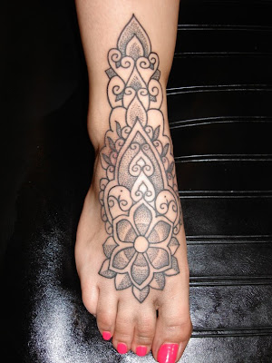 Comments: Feminine tattooed foot using dotwork shading.