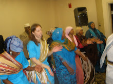 jullie Collins of LSS  and group of Somali women singing "dhaanto" fun time