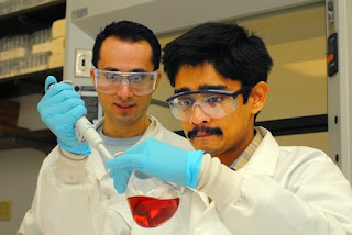 post-doctoral fellow Sudip Nath and graduate student Charalambos Kaittanis