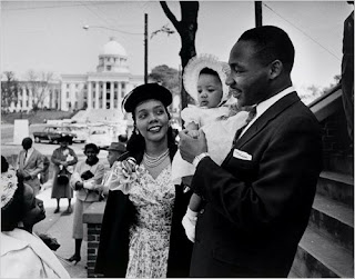 Martin Luther King Jr. stands with his wife, Coretta, and daughter Yolanda in 1956