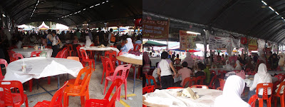 The lawn site set up a big tent for selling food and provide seat for people eating
