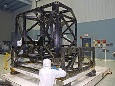 NASA engineers check out the unwrapped ISIM structure in a clean room NASA engineers check out the unwrapped ISIM structure in a clean room