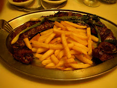 Steak with fries and veggie