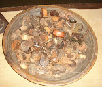 Old wooden bowl with antique casters