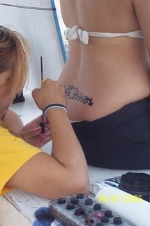 [womans_painting_tattoo.jpg]