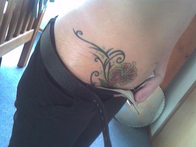 flower tattoo on stomach girl. Posted by selfpower. Labels: girl tattoo