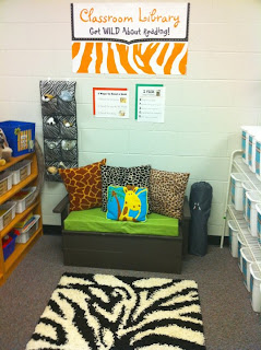 Reading Nook or Classroom Library with pillows, books, and rug for teaching first grade 