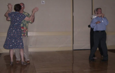 two couples dancing two couples dancing