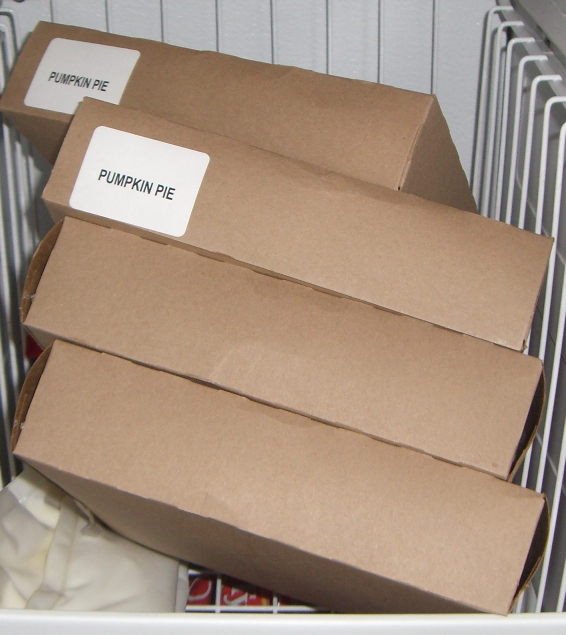 [four pumpkin pies in freezer.jpg]