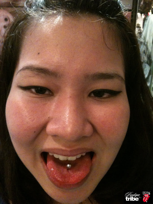 Tongue piercing title=