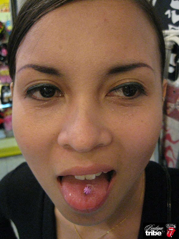 Tongue piercing title=