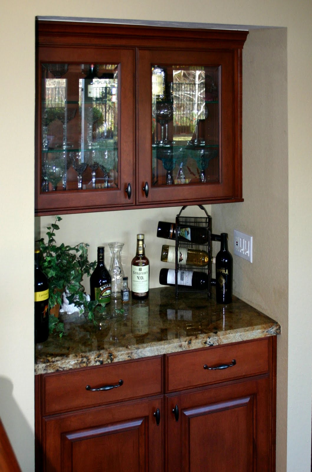 Bronze kitchen cabinet hardware before kitchen eating area after kitchen eating area with new railing
