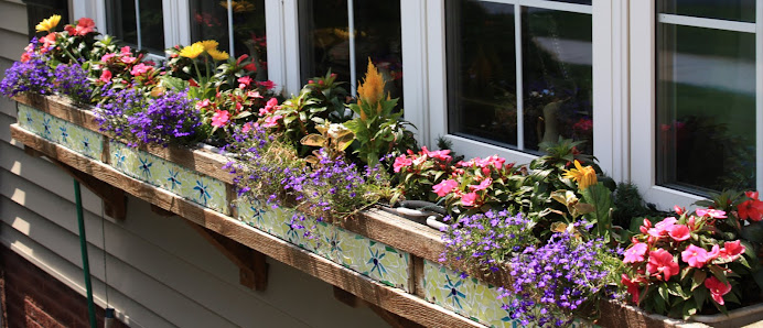 Tiled Window Boxes Along The Front Windows