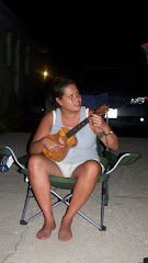 Lesli playing the Uke with Adam