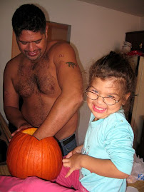 Chris Carving their Pumpkin
