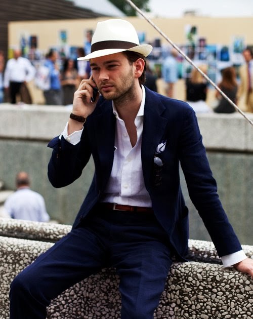 What to wear Panama hat, navy suit, brown belt, brown watch