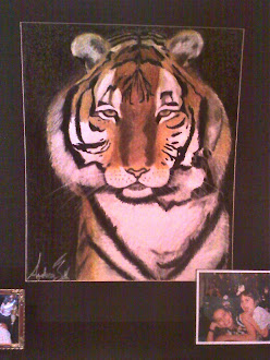 Chalk pastel drawing I made of a tiger.. with a picture of my sister and I as children :)