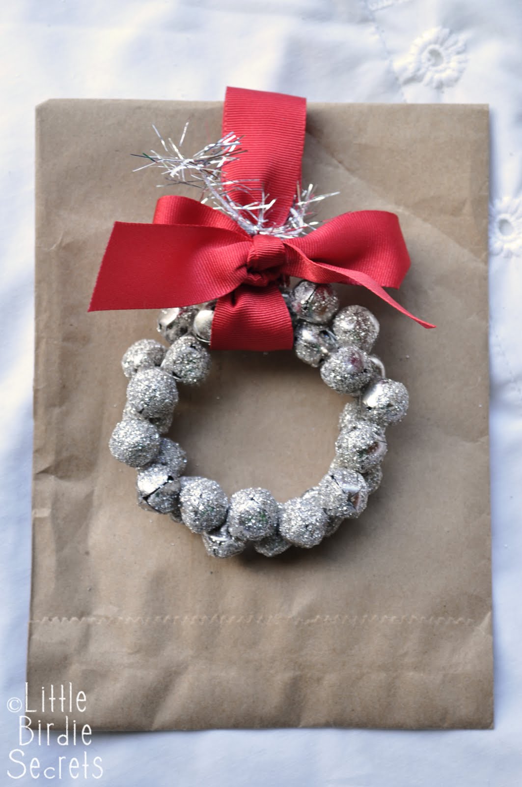glass glitter jingle bell wreath tutorial Little Birdie Secrets