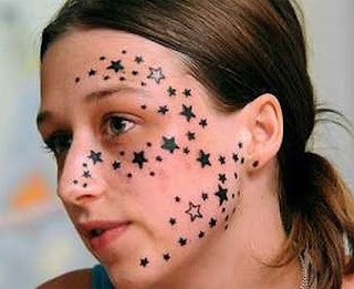 Women tattoos star on face  design
