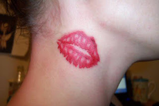 tattoos of lips on neck