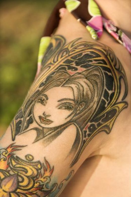 Om Tattoo Design: Angel arm tattoos ideas for men and girls