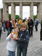 Enjoying a giant pretzel at the Brandonburg Gate
