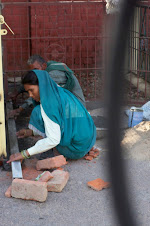 Woman Laying Bricks