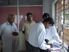 Lawyer Mr Satya Narayana Reddy signing the "Sale deed Registration" of "Rudolph Cottage" at "Banasw