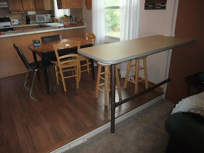 separate rooms with bar, island, counter top