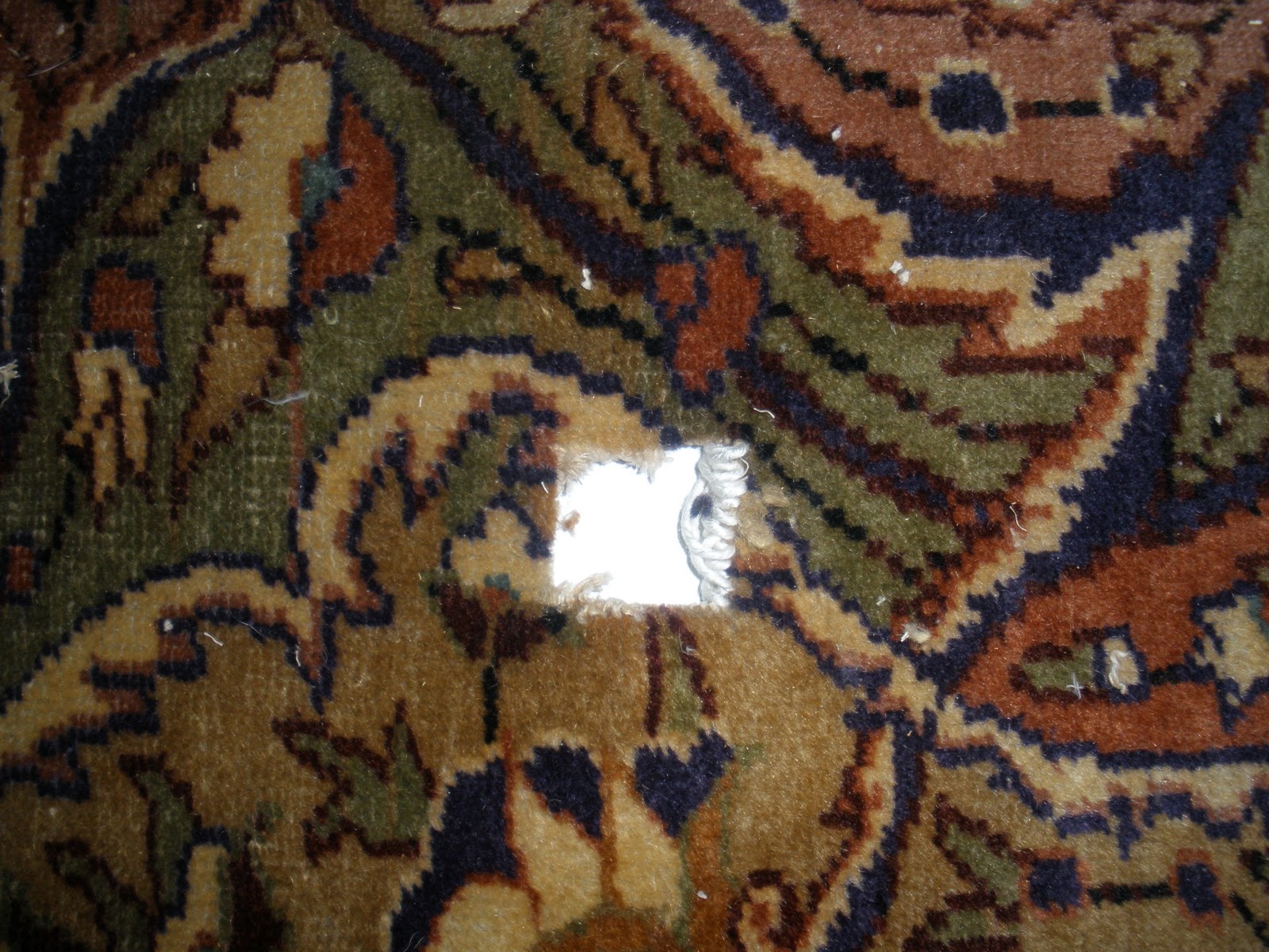 Kosker Traditional Rug Repair Repairing a Hole in a Turkish Carpet