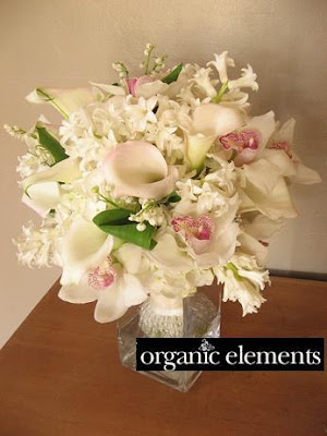Bridal Bouquet of Cymbidium Orchids, Lily of the Valley, Blush Calla Lilies, and Hyacinth United in a Crystal Wrapped Satin Ribbon