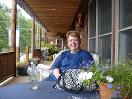 Colleen on front porch at Morning Glory