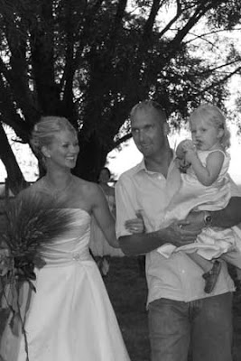 Backyard Country Wedding Ellensburg Wedding Photo o bride and groom with daughter