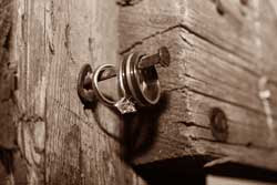 Backyard Country Wedding Ellensburg Wedding Photo of rings on rusty nail