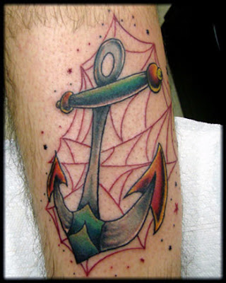 Anchor tattoo with waves and bird