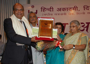 Professor Akhil chandra,Head ILA, receiving Hindi Academy award Chief Minister Sheela Dixit