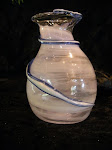 The glass vase with the Blue Ribbon