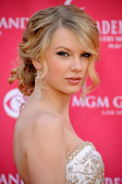 taylor swift hairstyle in love story. megan fox hairstyles 2010.
