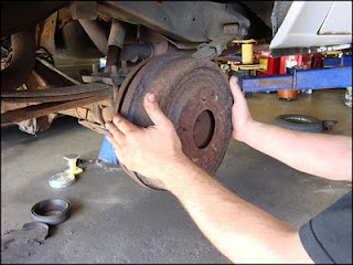 Car Repair How Do I Remove The Rear Brake Drums On A 1999 Dodge Ram Van 1500