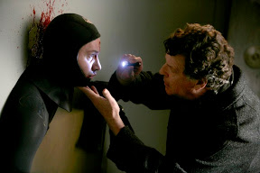 FRINGE: Walter (John Noble, R) examines a dead man trapped in a bank in the FRINGE episode Safe FRINGE: Walter (John Noble, R) examines a dead man trapped in a bank in the FRINGE episode Safe