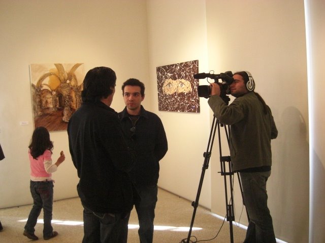 The Artist and curator of the exhibition Francisco Urbano giving an interview to TV