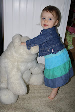 Elle is 1 and now taller than her bear!