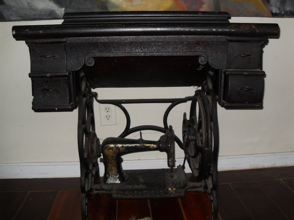 crazyredheadtravels Vintage black singer sewing machine & table