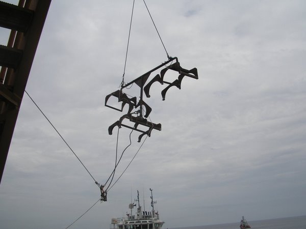 The same dummy, hanging to the crane...