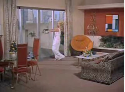 See Orange Plycraft chair in Li...