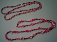 2 pink necklaces