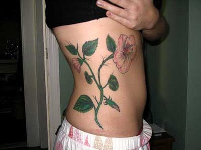 rib tattoo. flower rib tattoo sexy women.