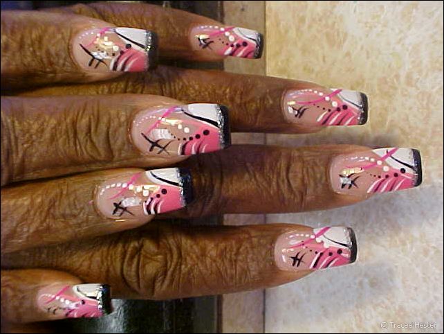 Pink, black, and white manicure for elderly African American woman